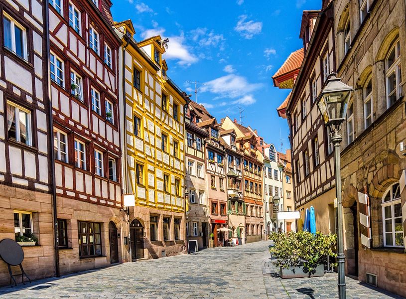 Nuremberg old town street with colourful half-timbered buildings