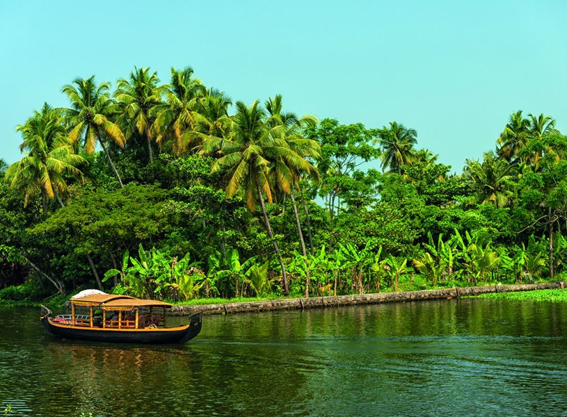 Alleppey Backwater with a boat, Kumarakom, Kerala, India 