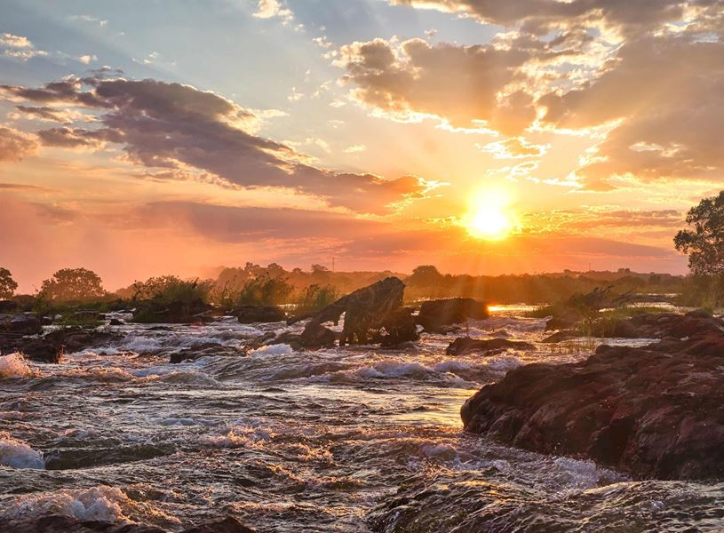 Sunset over Zambezi River near Victoria Falls in Zimbabwe