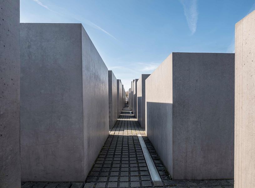 Berlin Holocaust Memorial concrete blocks with shadows in Germany