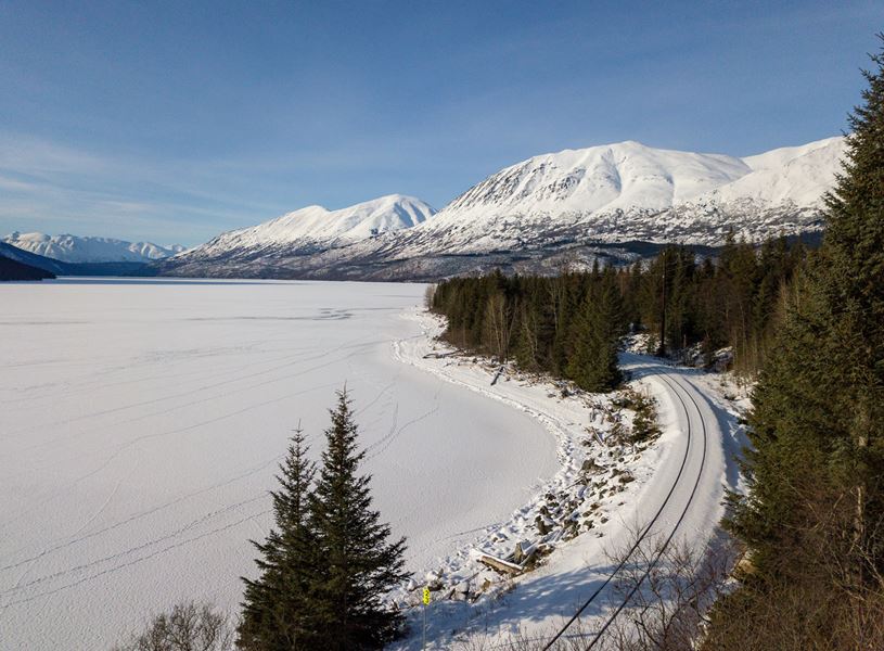 Alaska Railroad track during a clear winter day in Talkeetna, Alaska, USA