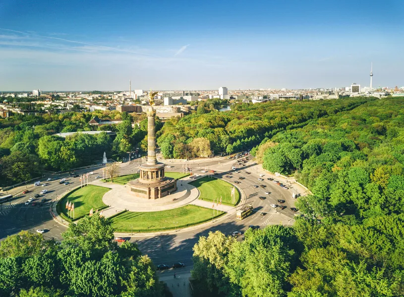 Aerial view of Berlin Victory Column with traffic and surrounding greenery