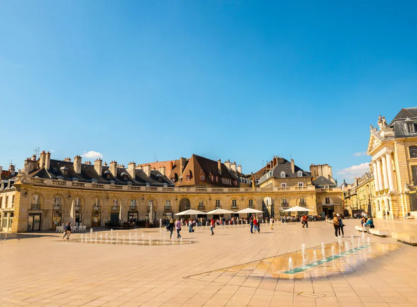 Liberation Square with fountains and historic buildings in Dijon, France