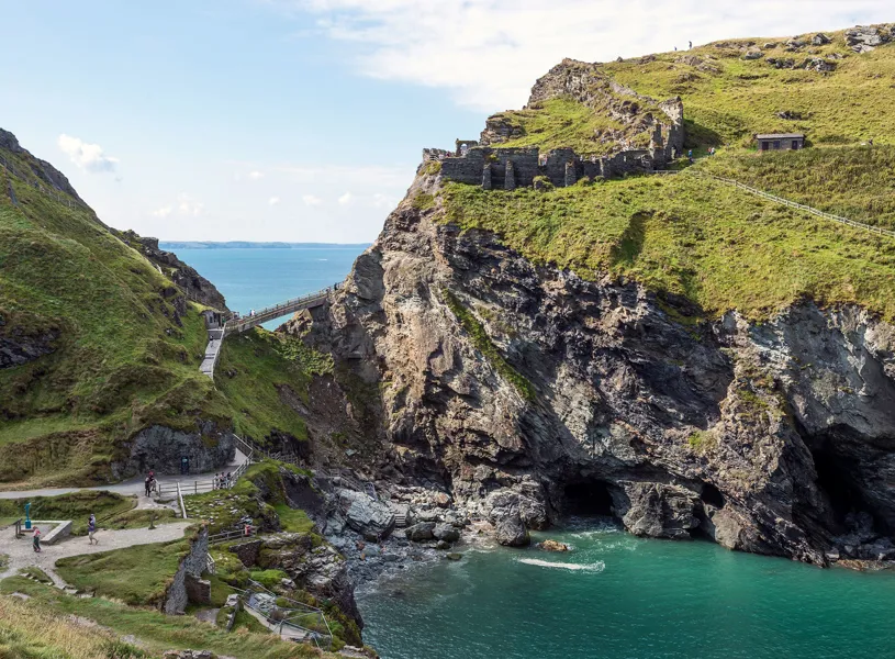 Tintagel Castle ruins with footbridge in Cornwall, England