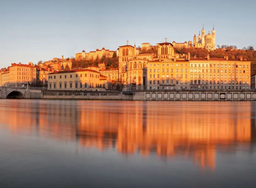 Panorama view of Lyon's Saône riverbank at sunset