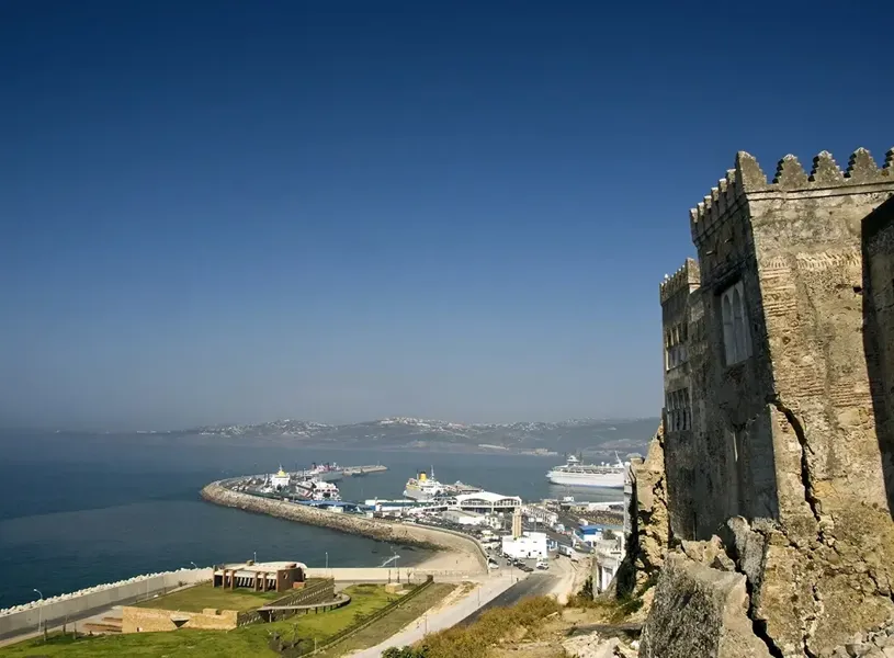 Tangier Kasbah overlooking port with ferries and blue sea in Morocco