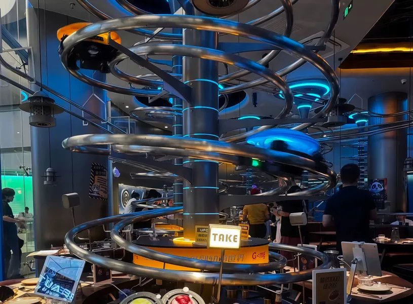 Dine with a difference at SpaceLab, Beijing's wildest spot. Order your meal, then watch it zoom down a spiral track straight to your table. It's sci-fi meets stir-fry – tasty food, neon lights and a seriously fun night out.