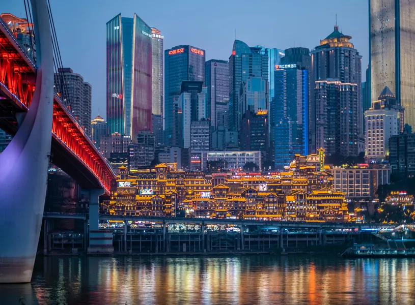 Chongqing skyline at twilight reflecting in water, Chongqing, China