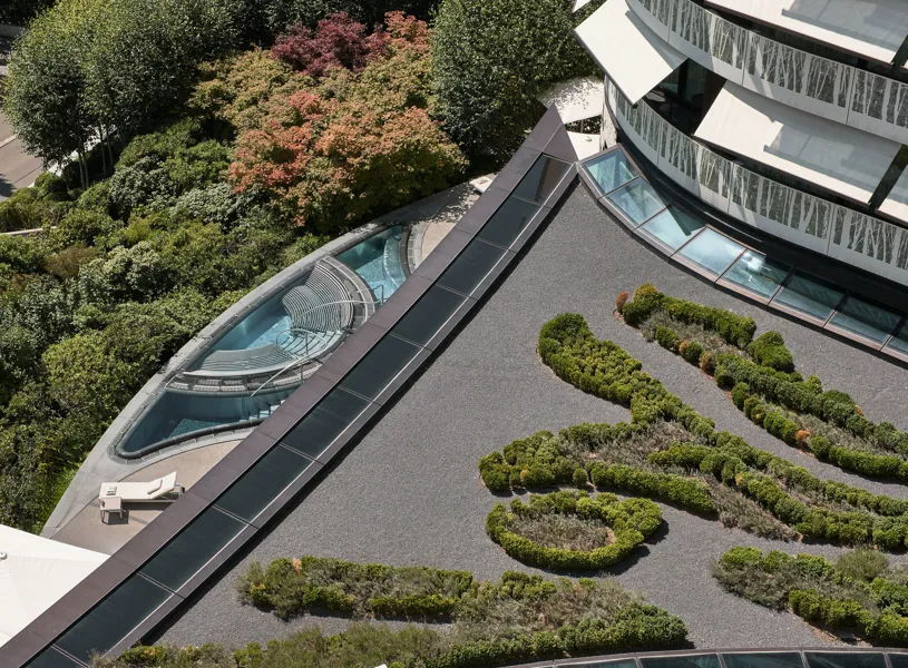 Exterior of The Dolder Grand Hotel and pool in Zurich, Switzerland