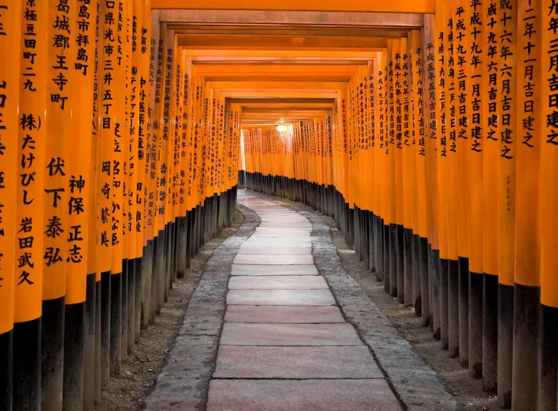 Pathway of Torii Gates at Fushimi Inari Shrine in Kyoto, Japan