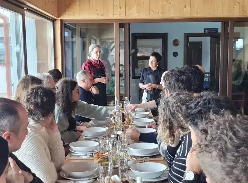 Guests enjoying dinner at Be My Guest Experience - HOF Hărman with hosts Ioana and Corina, Harman, Romania