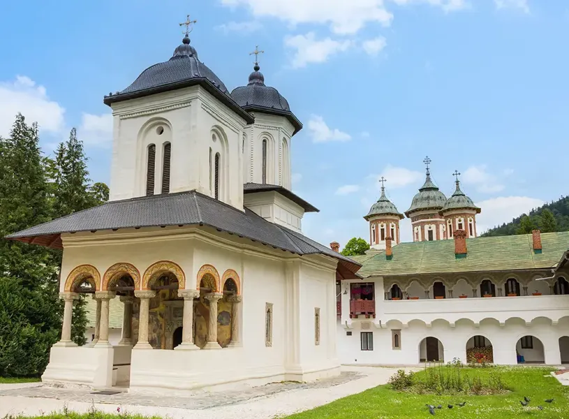 White church at The Sinaia Monastery in Prahova Valley, Transylvania, Romania