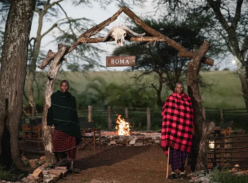 ole-serai-luxury-camp-BOMA-celebration-dinner-serengeti-tanzania