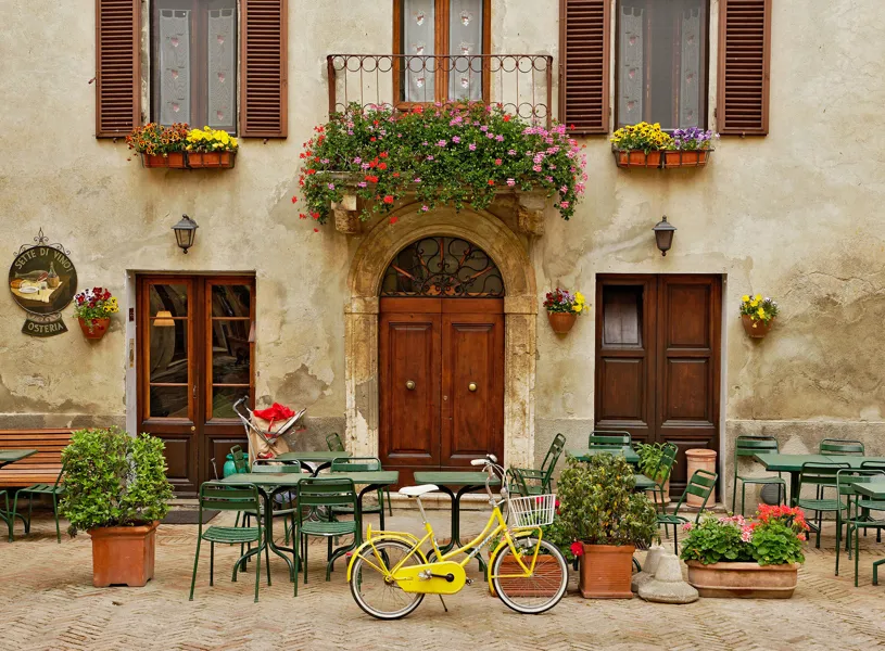 Bicycle in Front of a Small Cafe in Tuscany