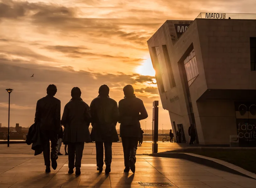 The Beatles Statue at Sunset in Liverpool, England