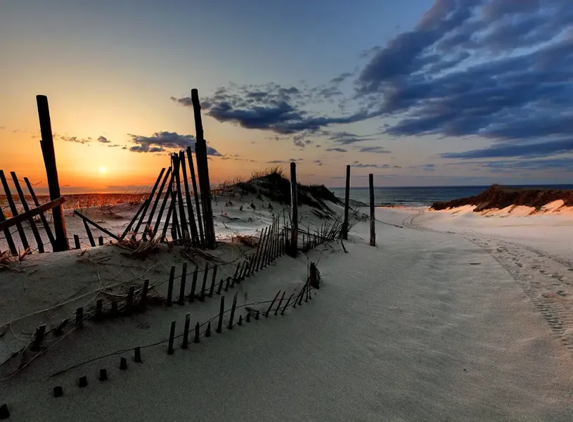 Beachfront at golden hour sunset in Cape Cod, Massachusetts USA
