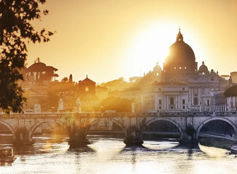 View of St Peter's Basilica across the river Tiber in Rome, Italy