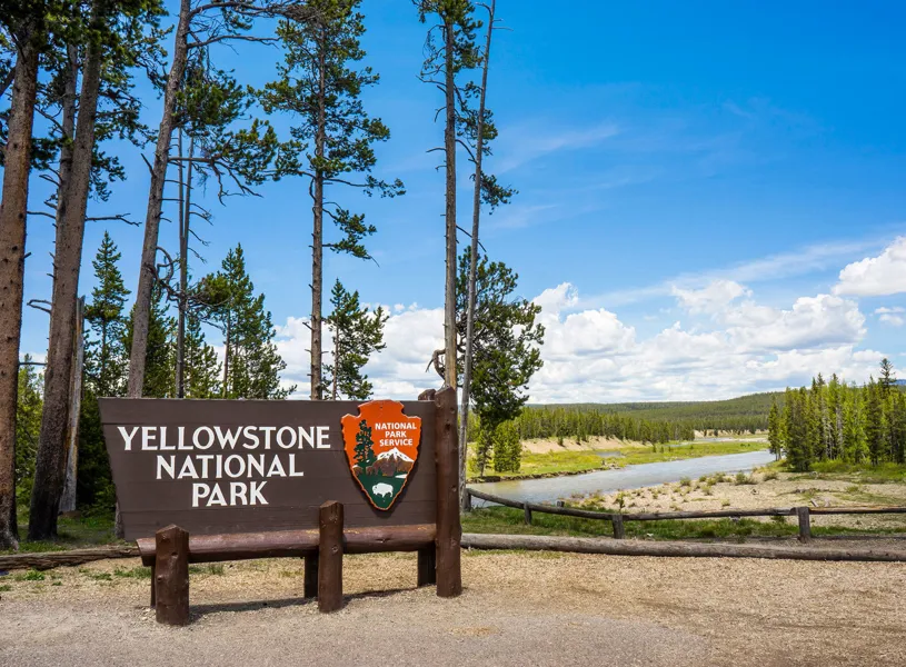 Sign for Yellowstone National Park at the South Entrance, Wyoming, USA